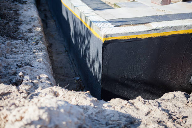Professional Waterproofing technician working in Eagan, MN